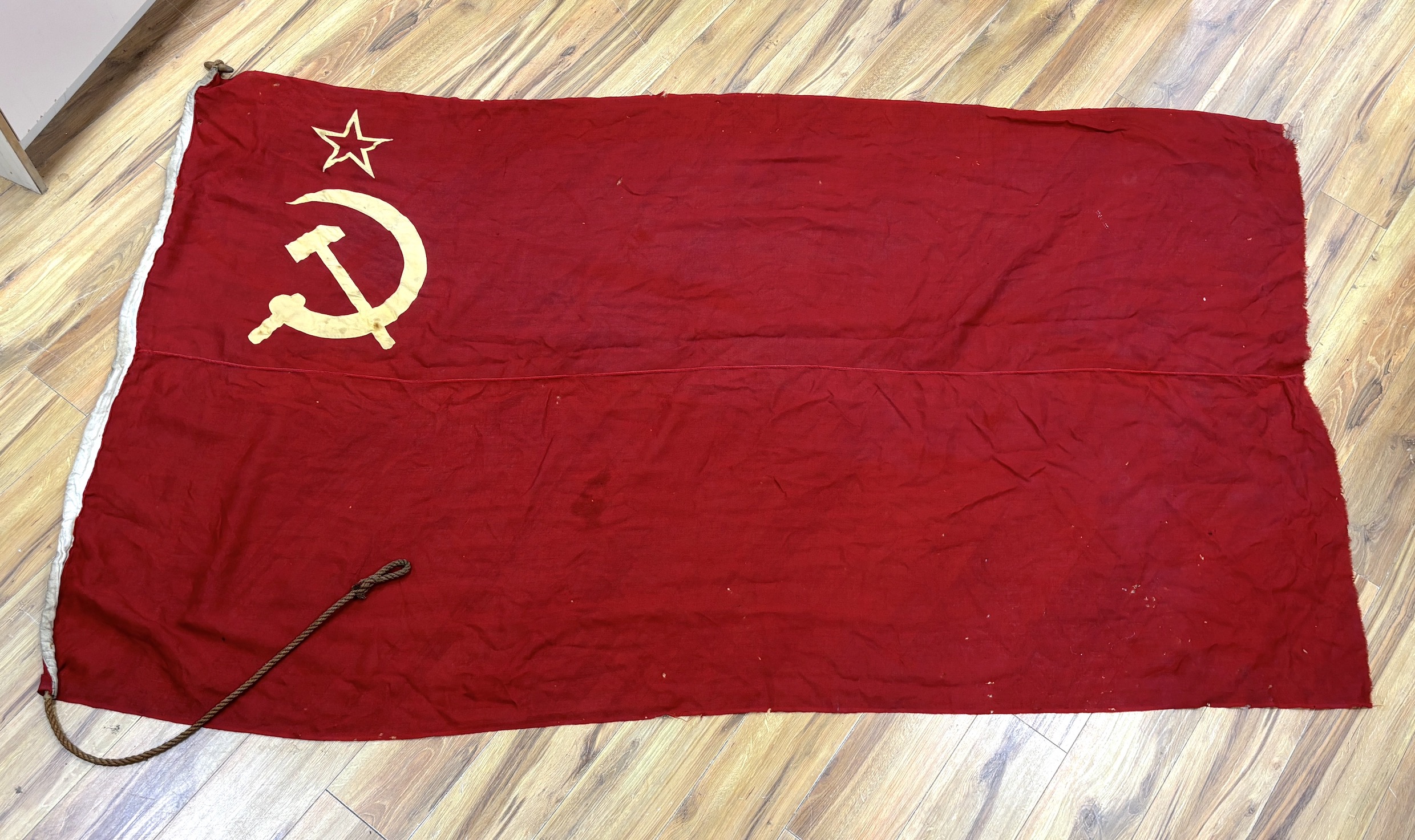 An early 20th century Soviet Union flag and an early 20th century Dutch flag